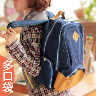  韩版潮学院风帆布配皮时尚大容量背包休闲中学生书包双肩电脑包