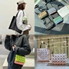 日本几何菱格袋鼠斜跨包时尚，休闲7格格子单肩手提子母包托特(包托特)包