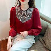 韩版春季轻熟圆领，百搭珠片拼接缎面红色泡泡，长袖衬衫打底上衣