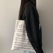 学生装书帆布袋小众设计ins韩风单肩包钢琴书，袋子布包文艺帆布包