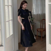 露腰连衣裙女2023年夏季高级感赫本风时尚气质泡泡袖镂空气质长裙
