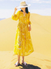 沙漠旅游波西米亚连衣裙女夏季新疆拍照海边度假沙滩裙黄色长袖裙
