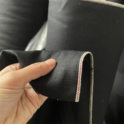 。日本进口全棉纯棉，斜纹牛仔布黑色牛仔面料牛仔裤，布料红边赤耳边