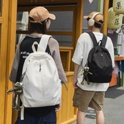 高中轻便书包女大学生大容量纯色，旅行休闲男双肩包电脑包背包