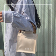 新中式小众设计师手提包女时尚真竹节手柄 真丝绸缎 手拎包手机包