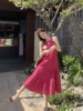 玫红色镂空挂脖连衣裙女夏季2024设计感木耳边中长款度假裙子
