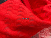 进口秋冬大红色立体波浪剪花，针织羊毛全毛时装，面料大衣外套