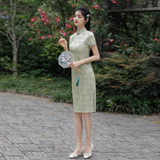 2024夏季中国风短袖中长款绿色修身蕾丝年轻改良修身立领复合旗袍