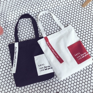 韩国简约帆布包袋女文艺飘带字母单肩帆布包休闲手提环保袋购物袋