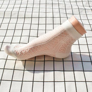 绢丝竹纤维女袜中筒超薄网眼夏季镂空袜子日单甜美透气吸汗米白袜