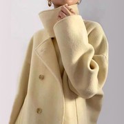 2023冬季时尚气质鹅黄色高龄双排扣长款双面呢羊毛大衣女