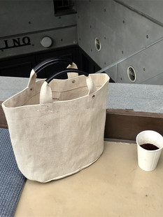 通勤方便帆布水桶包女补习装书手，拎包装饭盒袋上班用ins手提布包