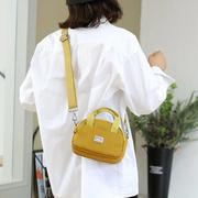 新加坡女包2023时尚迷你手提单肩横款帆布小包纯色多层斜挎包