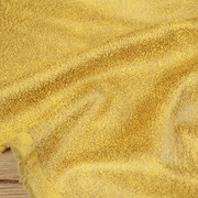 黄色双面烫金麂皮绒布料 很柔软微弹力不脱边流苏 服装沙发背景