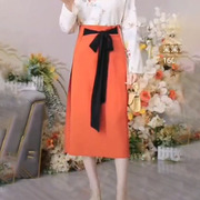 高级感橘红黑拼色设计半身裙女春夏高腰遮胯显瘦气质直筒裙子