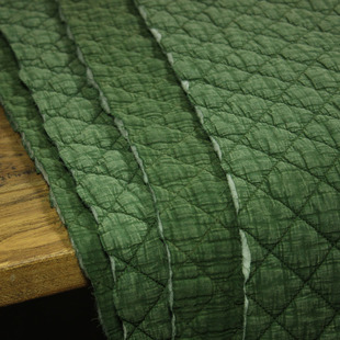 瓦娜双层夹绗棉秋冬面料纯棉，菱形砂洗袍外套裙子服装布墨绿色