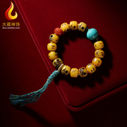 藏式牛骨手串饰品藏式文玩，雕刻做旧佛珠，手串红宝石绿宝石男手链