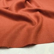 橘色细人字斜纹毛呢布料春秋保暖纯色裙子外套设计师服装面料