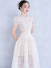 越南小众白色露腰镂空短袖连衣裙中长款收腰显瘦甜美刺绣长裙女