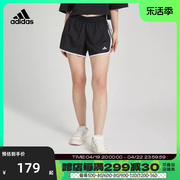 adidas阿迪达斯2024女子运动裤，健身训练五分裤宽松梭织短裤ic5184