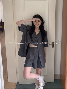 hu2024夏季韩版设计感假两件时尚，气质短袖西装+休闲短裤套装