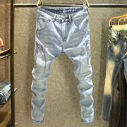 夏季美式机车风牛仔裤男款个性拉链口袋长裤子高端拼接修身小脚裤