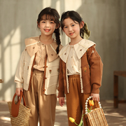 女童2023秋季单排扣花朵娃娃领长袖中大童韩版可爱上衣衬