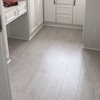 家用强化复合木地板环保金刚板卧室防水浅灰色欧派包安装