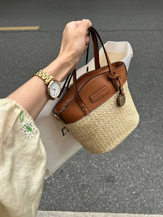 日本STELU草编手提包时尚拼接水桶包小众设计复古撞色沙滩斜挎包