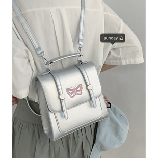 小众银色蝴蝶双肩包包女式2024潮时尚学生背包百搭手提旅行包