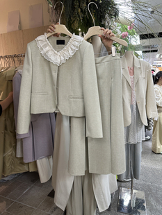 春季韩版宽松拼双层娃娃翻领包扣外套+高腰后橡筋半裙两件套