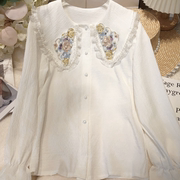 春季2024森系刺绣花朵娃娃领白色衬衫设计感小众长袖宽松衬衣