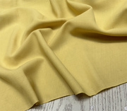 大牌进口雅黄色细腻微弹力，绉织纱纯羊毛，面料设计师裤子连衣裙布料