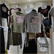 个性猫咪印花长袖T恤女2023秋季韩版修身短款可爱断袖设计感上衣