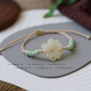 新中式花朵编织手链原创设计小众复古手饰，民族中国风陶瓷手绳配饰
