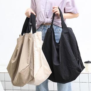 今年流行的包包 韩版简约大容量手提包休闲文艺帆布旅行包百
