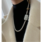 一白阿猫 原创设计秋冬毛衣链复古凤牌强光天然珍珠项链颈链
