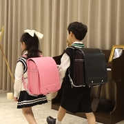 日本小学生书包儿童双肩背包男女童减负护脊书包防溺水1-3-6年级