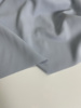 E368春夏季浅蓝色梭织混纺布头柔软细腻垂感裤子西服上衣服装面料