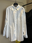 白色露肩衬衫女夏2023设计感小众上衣韩版中长款显瘦长袖衬衣