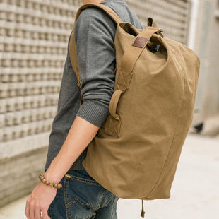 新潮代旅行包男大容量旅行袋行李背包休闲双肩帆布手提旅游圆桶包