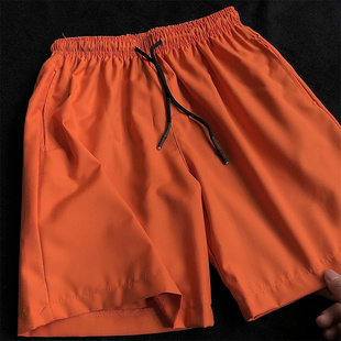 橙色运动短裤男夏季冰丝，薄款橘色休闲五分裤潮牌橘红色纯色裤子夏