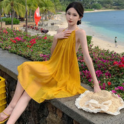 高档品牌超仙飘逸灵动黄色，抹胸吊带挂脖裙露背氛围感海边度假风仙