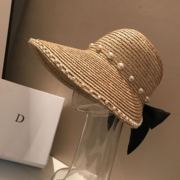 夏季时尚潮蝴蝶结手工珍珠帽子拉菲草帽沙滩帽空顶帽檐遮阳帽女潮