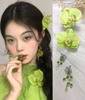 创意妆造仙气异域风情绿色花朵蝴蝶兰发饰花花写真拍照头饰女发夹