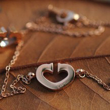Cartier serie amor de los corazones el amor de apertura K colgante de corazón de oro rosa de oro de titanio Collar de acero