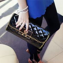 2013 new women clutch handbag clutch bag female leather patent leather shoulder bag new wave in Europe and America