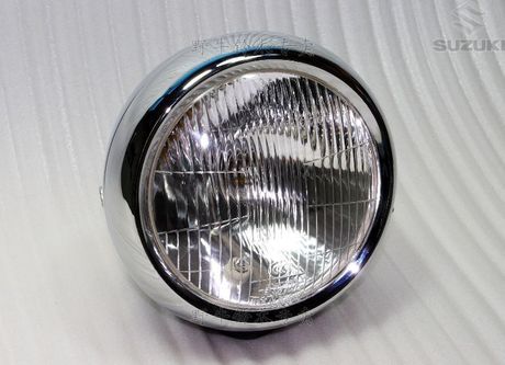 望江铃木:GN250大灯总成。纯玻璃面罩~纯金属