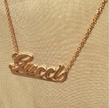 GUCCI Gucci joyas, europeos y americanos logotipo de letras grandes huecos de oro de 14k oro collar rosa