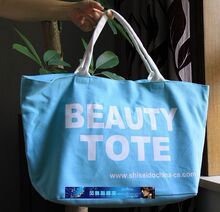 资生堂专柜赠品：白色字母淡蓝色帆布包休闲包  环保包袋 大包